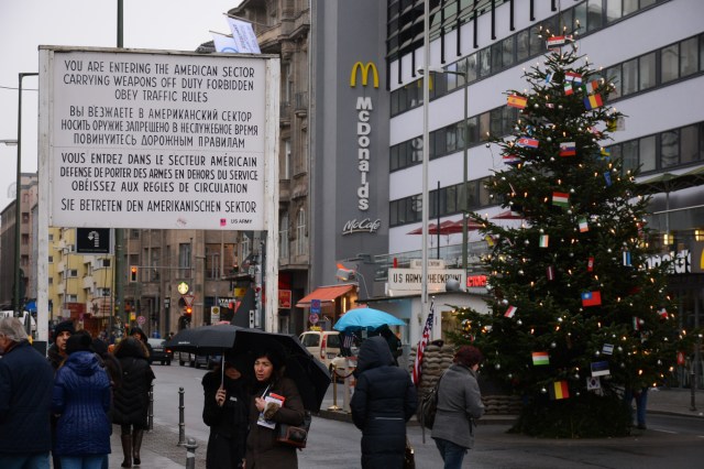 The evils of the West loom over Checkpoint Charlie